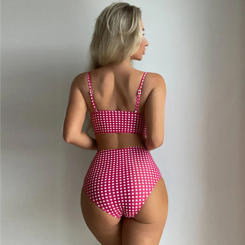 Women's rose red plaid high-waist bikini swimsuit with split briefs on a mannequin.