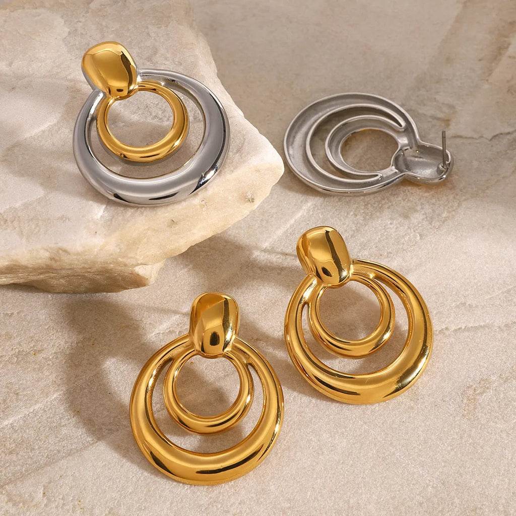 18K gold plated double layer hollow stud earrings with round geometric shape on titanium steel