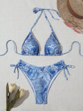 Women's denim blue print bikini set with strap detailing on polyester blend fabric