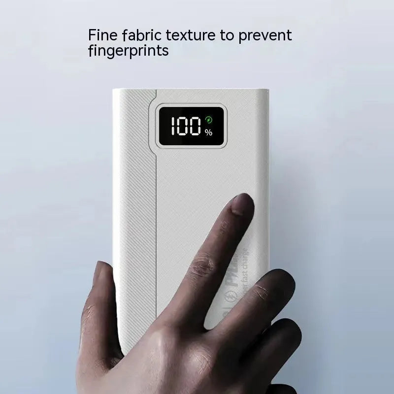 Black and white large capacity power bank showing front view with dimensions 150mm by 76mm.