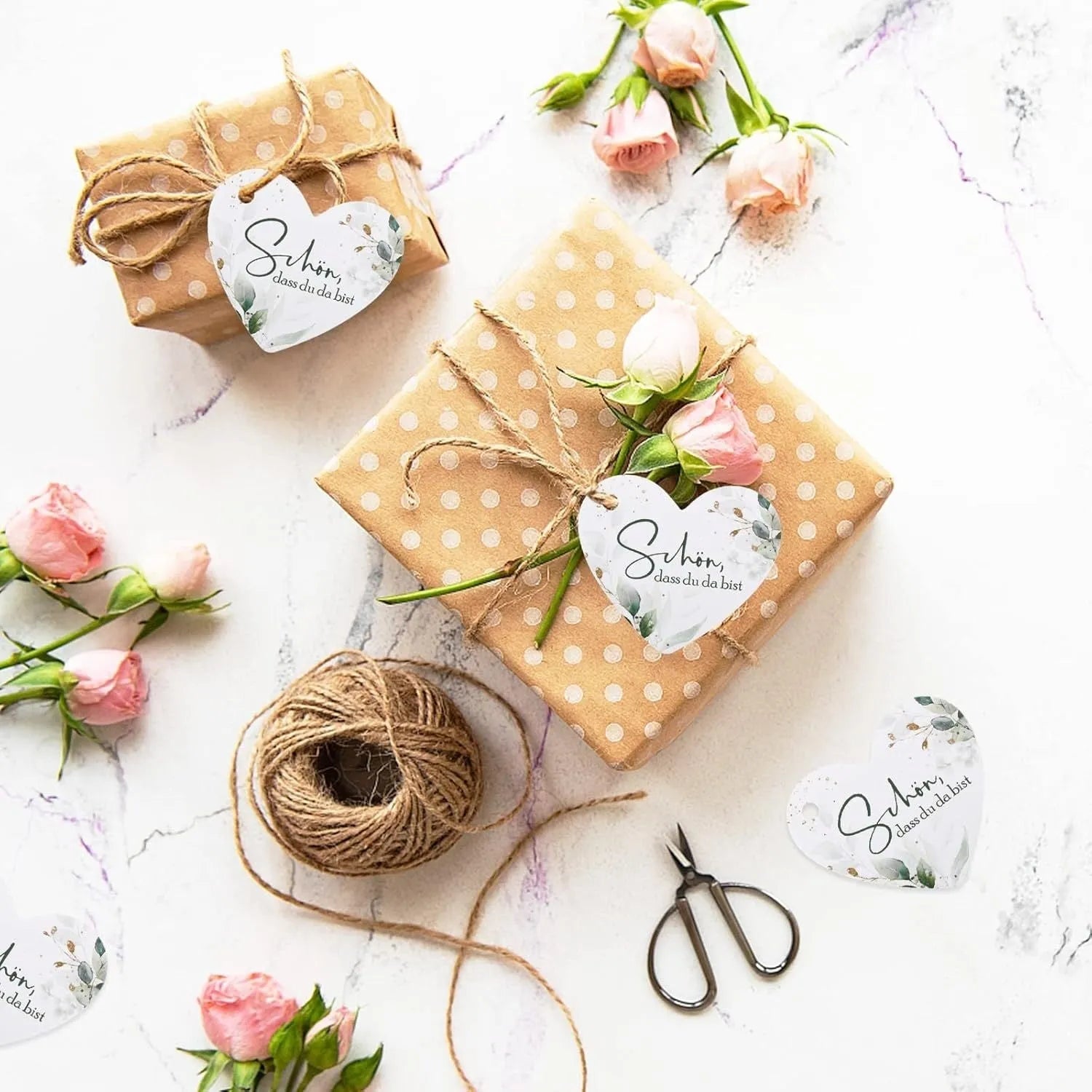 Set of fifty paper heart-shaped gift tags with floral patterns in two colour style options