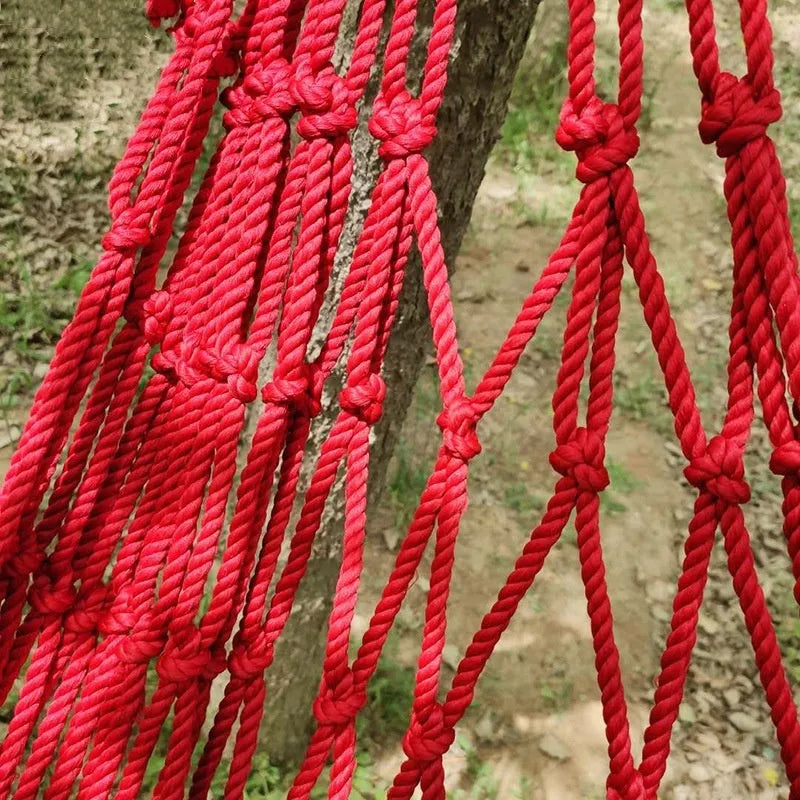 Nylon rope mesh hammock measuring 1.1m wide by 2.1m long with bold pattern design
