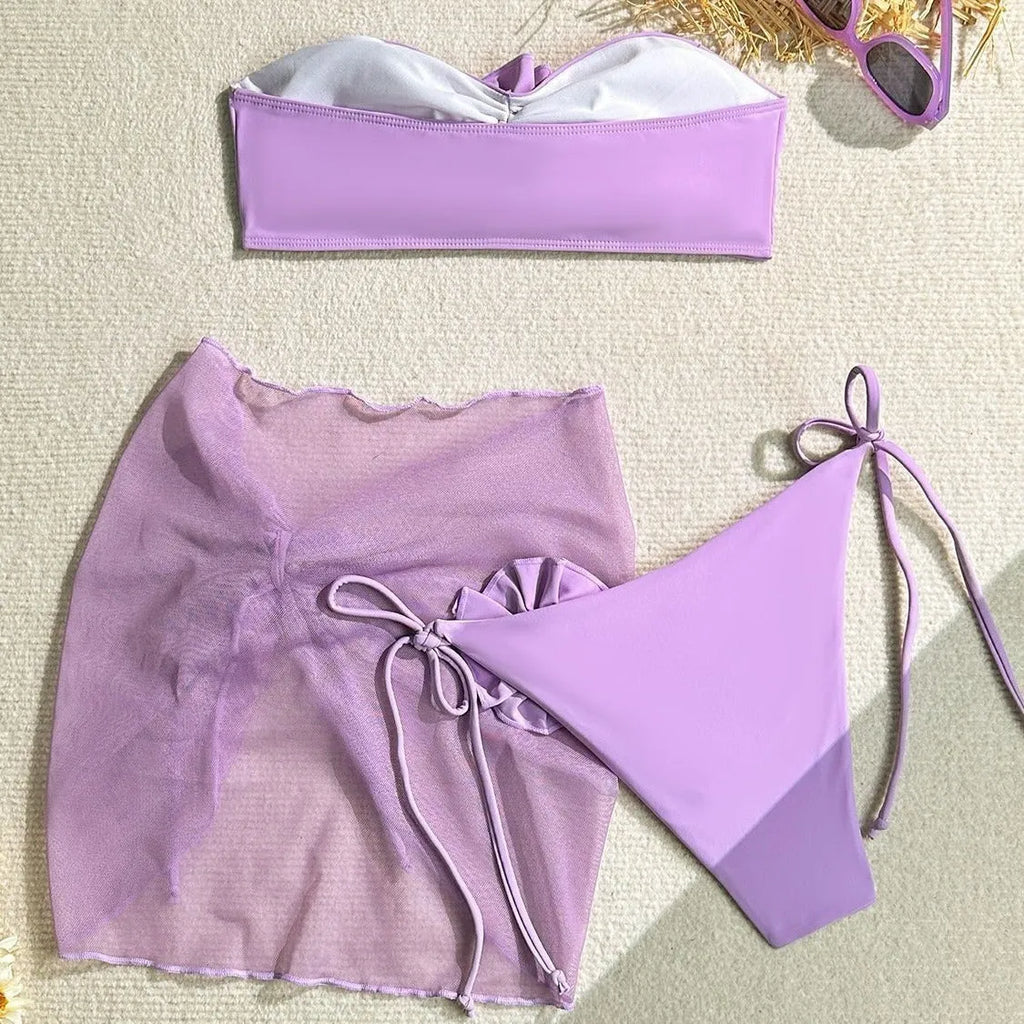 Women's blue tube top swimsuit with large 3D flower tie, matching pants and skirt