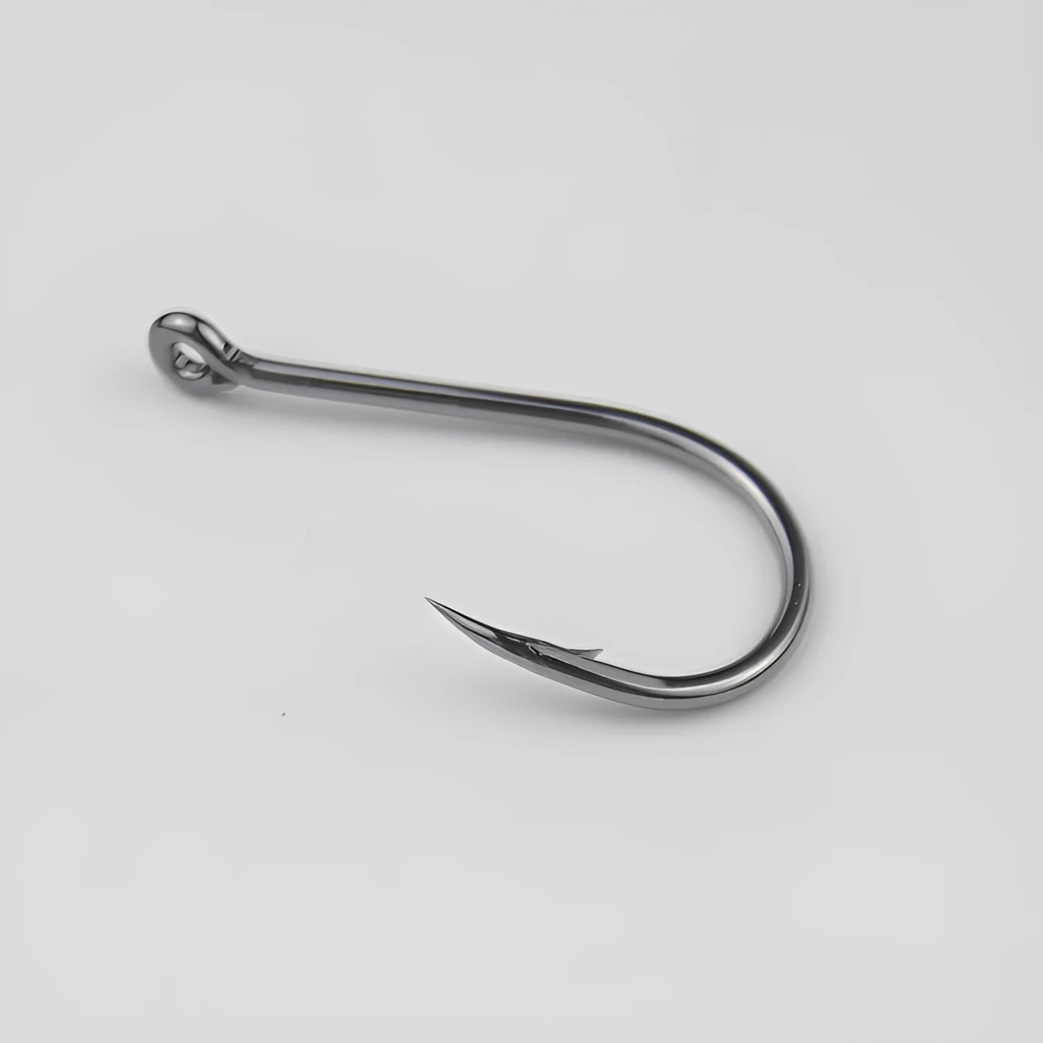 Barbed fishing hooks with crooked mouth and hole ring in alloy carbon steel for rock and sea fishing