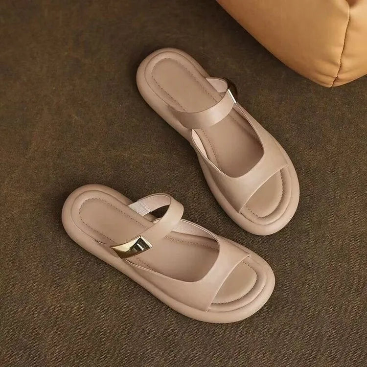 Apricot and white women's platform sandals with a peep toe and flat rubber sole.