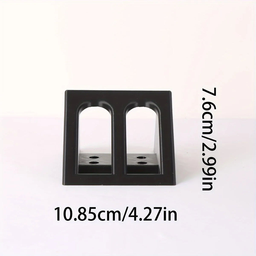 Black plastic pistol display stand for toy guns and cosplay accessories.