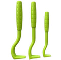 Three plastic tick removal clips for pets in blue and green on a white background.
