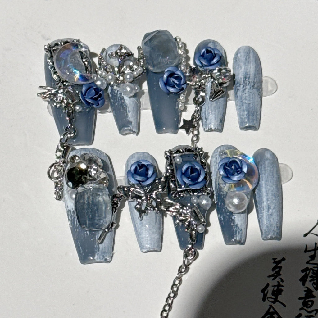Heavy industry blue nail stickers with twinkling rose and tulip patterns for evening manicures