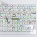 Full set of colourful PBT key caps for mechanical keyboards with printed cat and puppy designs.
