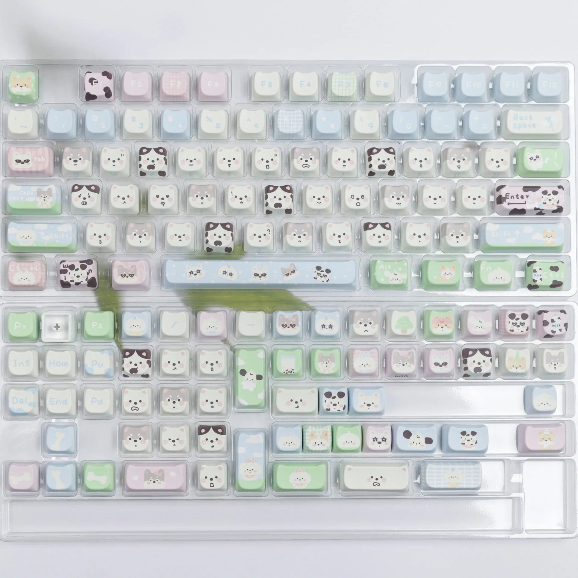 Full set of colourful PBT key caps for mechanical keyboards with printed cat and puppy designs.