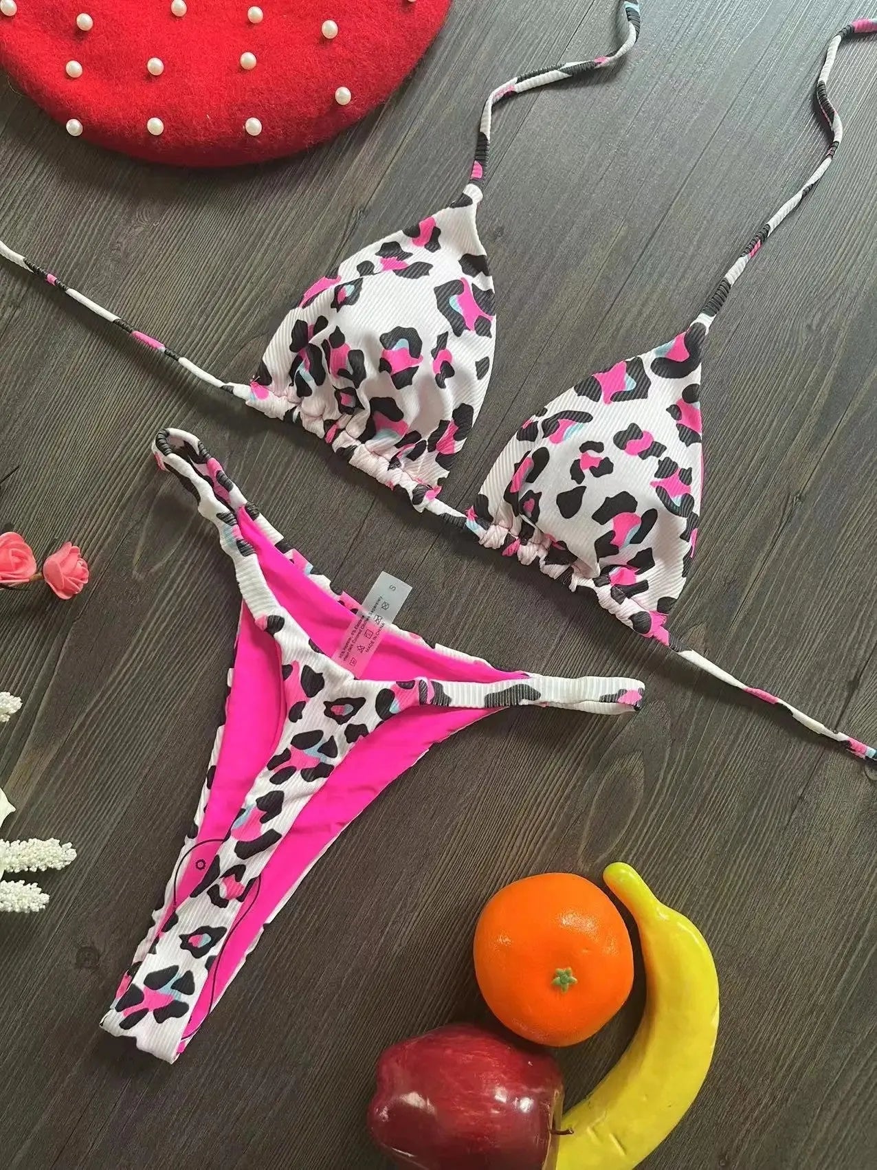 Women's printed beach bikini swimsuit with cotton lining on mannequin