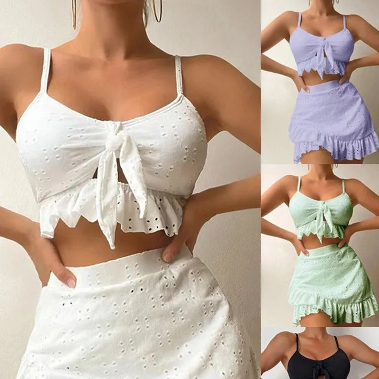 Women's three-piece bikini set with split hip skirt in polyester fabric for swimming