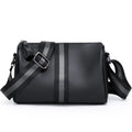 Black genuine leather women's crossbody bag showing front view and shoulder strap