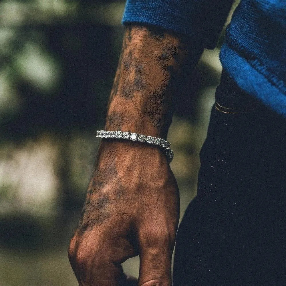 Men's silver alloy hip hop bracelet with a row of clear rhinestones and a tennis charm on a link chain.