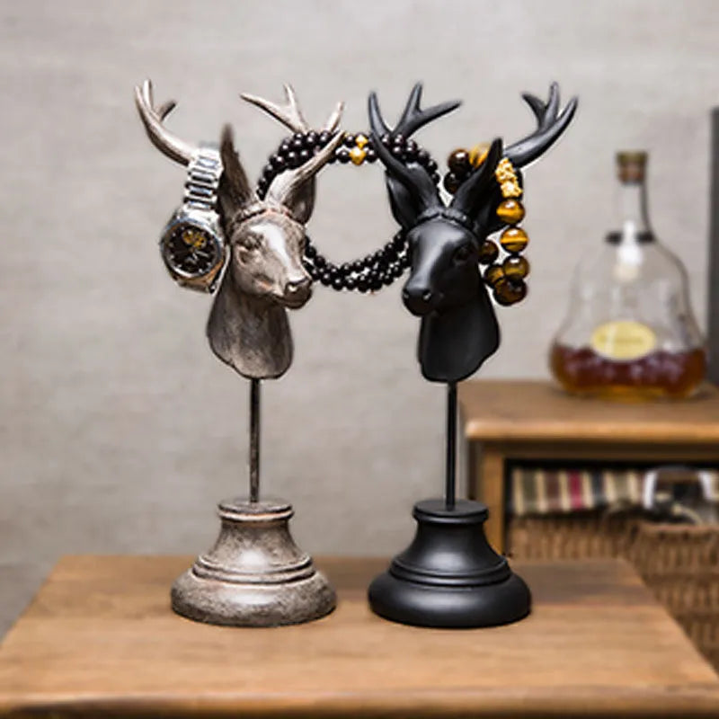 Woodland animal resin sculpture home decoration in black, white, and wood colour finishes.