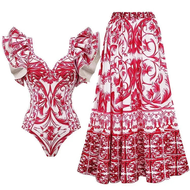 Women's printed polyester one-piece swimsuit on a hanger showing rose pink colour.