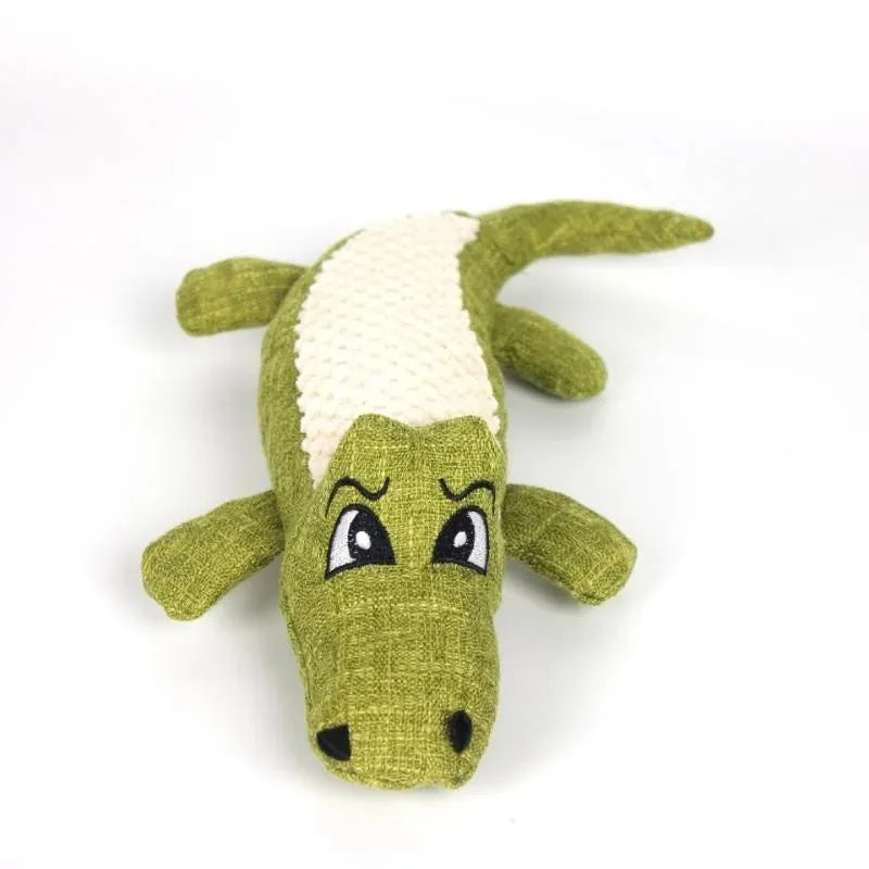 Plush corn-shaped pet toy with squeaker in blue, green, or red for chewing and grinding.