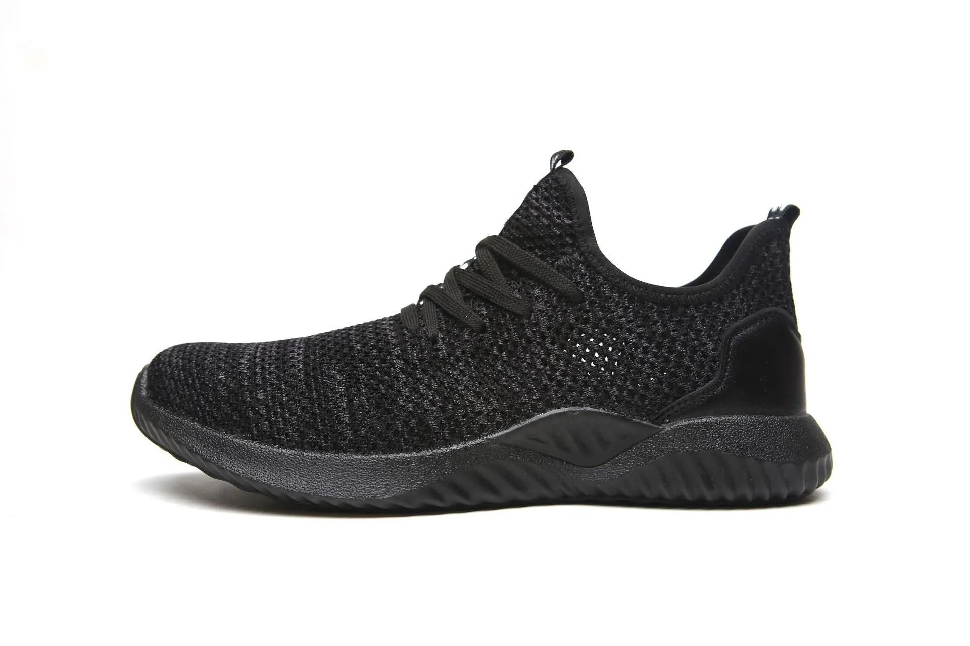 Low-cut black safety work shoes with a steel toe cap and EVA midsole on a grey background.
