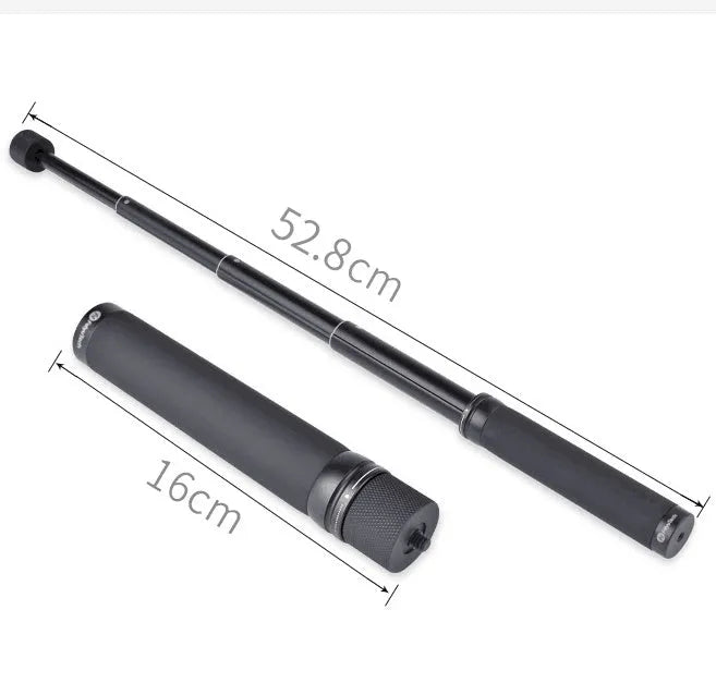Black retractable aluminium selfie stick with hand-held stabiliser grip holding a smartphone.