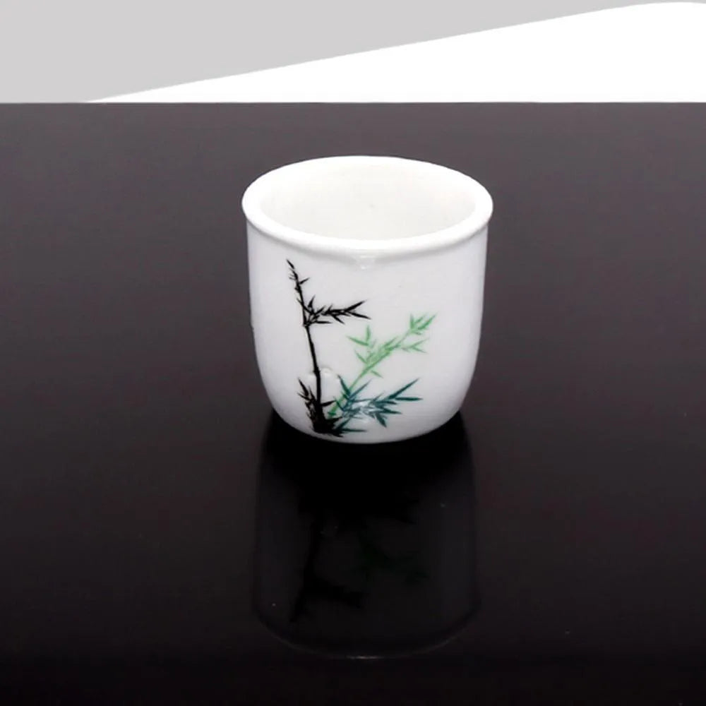 Black and white acrylic square reflection boards for product photography on a table