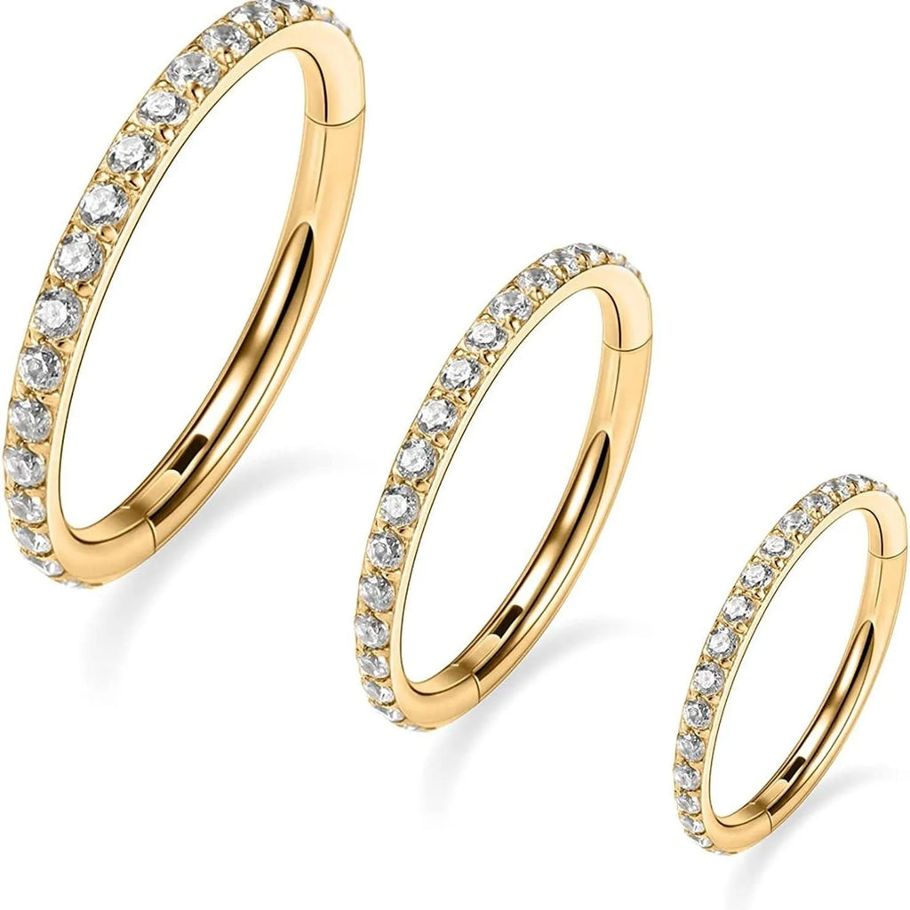 Stainless steel seamless nose ring with diamond detail showing round shape and colour finish options