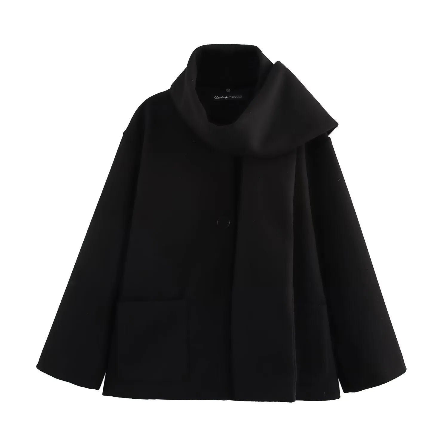 Women's long black polyester overcoat with a gray artificial fur collar, showing street fashion style and front pockets.