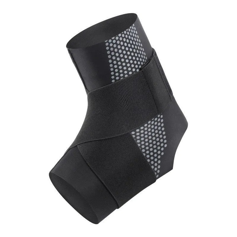 Black Lycra ankle support brace wrapped around an adult ankle.