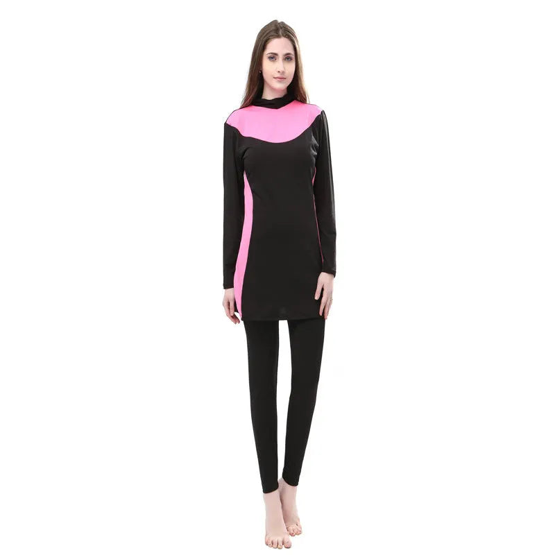 Conservative women's swimsuit with long sleeves and hood in black with coloured accents