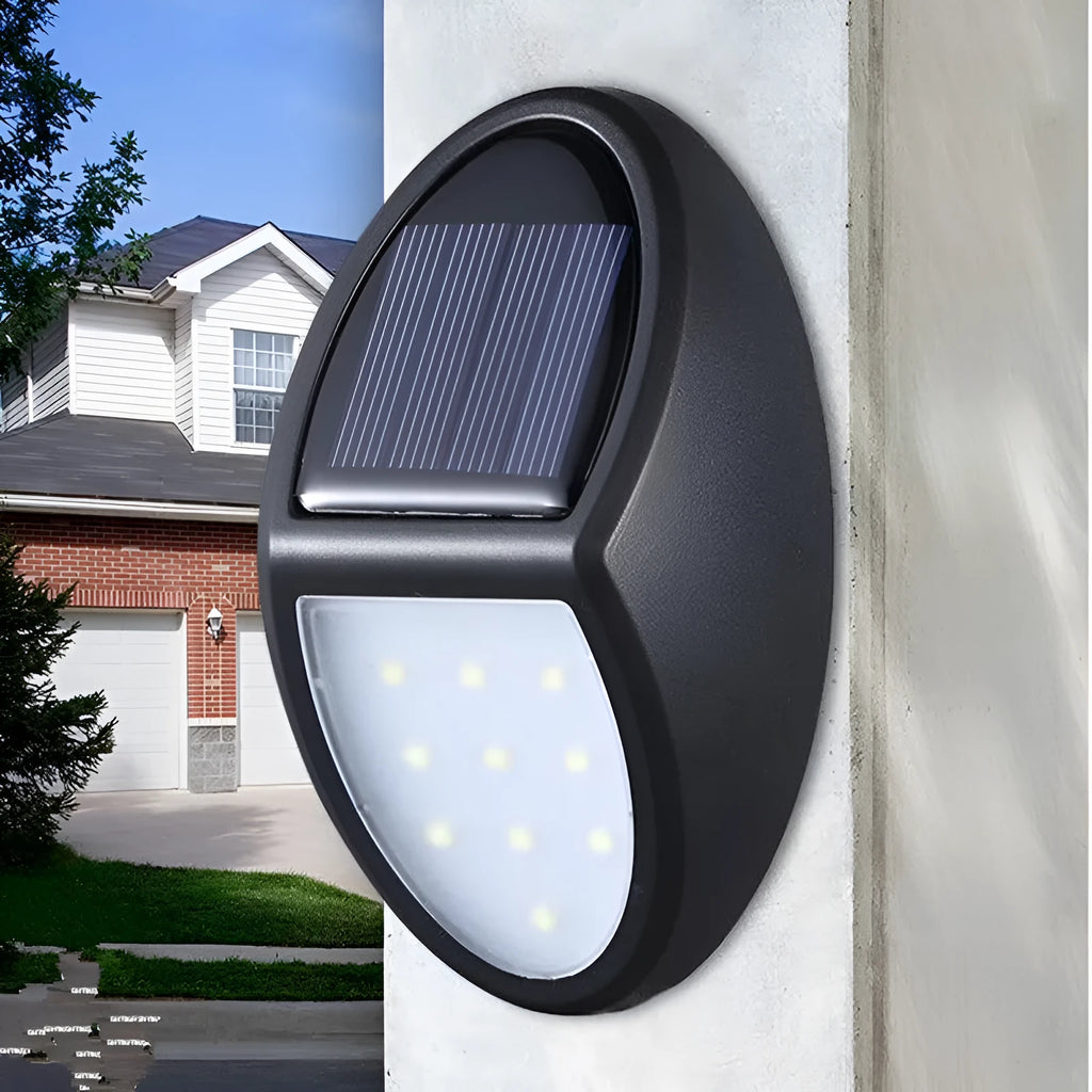 Black solar-powered LED wall light with solar panel and motion sensor