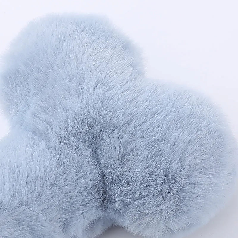 Blue Love Bone shaped plush dog toy with bite resistant texture and internal squeaker.