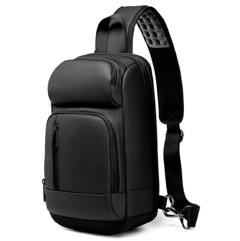 Black medium PVC outdoor shoulder bag showing air cushion strap, soft handle, and internal organiser pockets.