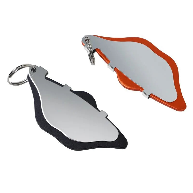 Mountain bike disc brake pads replacement set in black and orange colours with adjustment flap