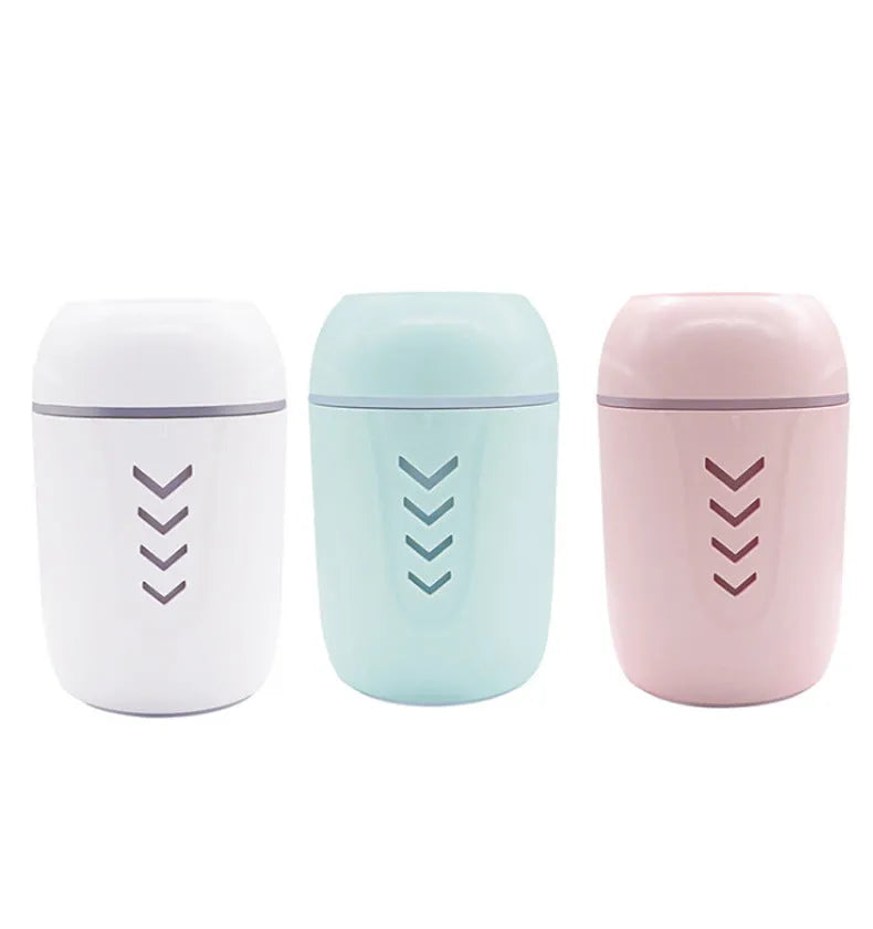 Portable car humidifier with columnar design in blue colour showing mist outlet and control dial