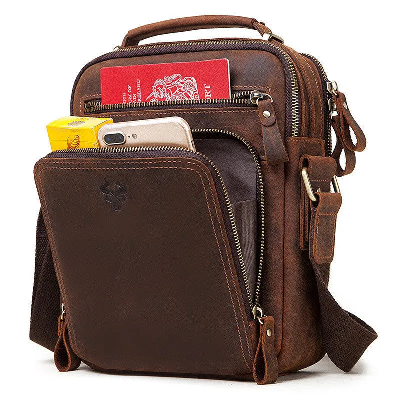 Men's brown genuine leather crossbody bag with single shoulder strap and visible stitching