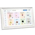 White 15.6 inch smart digital photo frame with app control on a wooden desk.