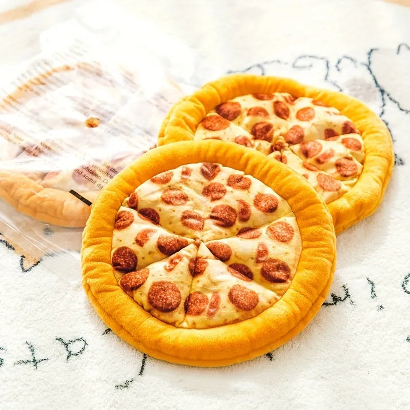 Yellow pizza slice squeaky plush dog chewing toy on white background