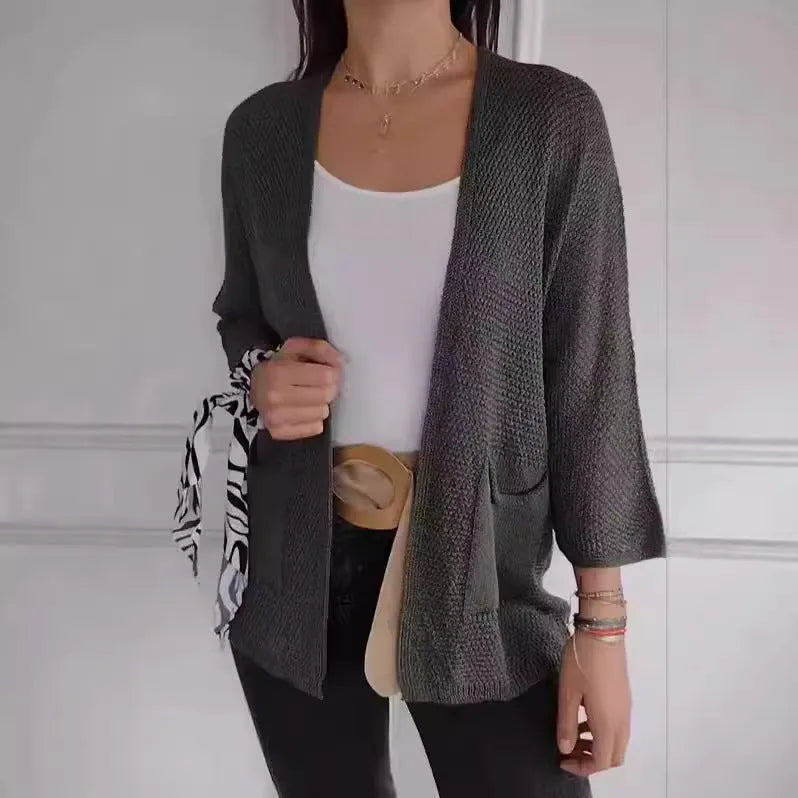 Women's waffle texture cardigan coat with nine-quarter sleeves in army green colour showing pocket details