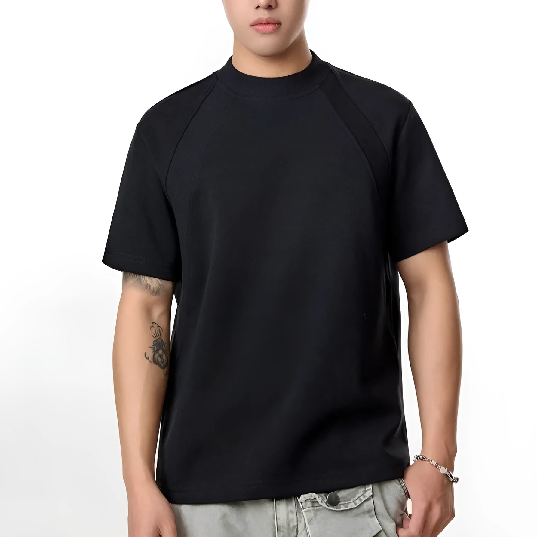 Black loose fit short sleeve top with textured air layer stitching detail