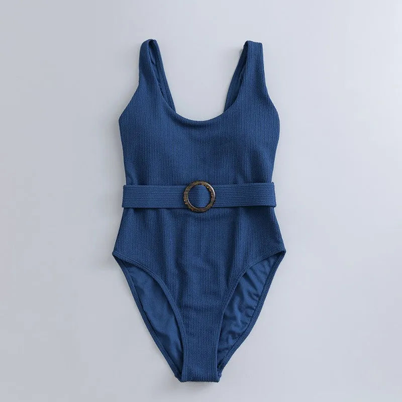 Navy blue women's one-piece swimsuit with triangle slimming design and chest pad support
