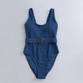 Navy blue women's one-piece swimsuit with triangle slimming design and chest pad support