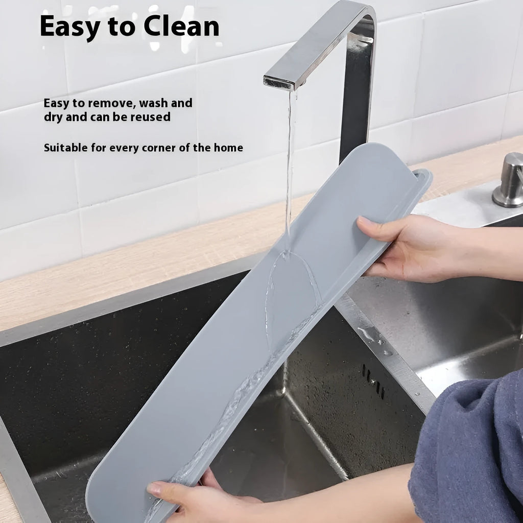 A thick gray blue black silicone kitchen sink splash guard measuring 52mm by 85mm.
