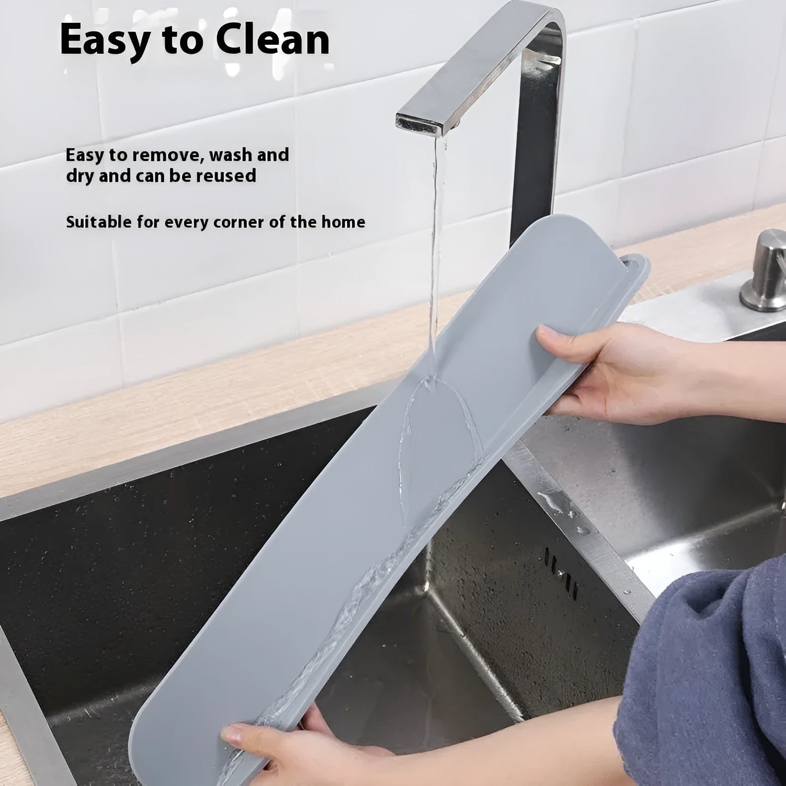A thick gray blue black silicone kitchen sink splash guard measuring 52mm by 85mm.