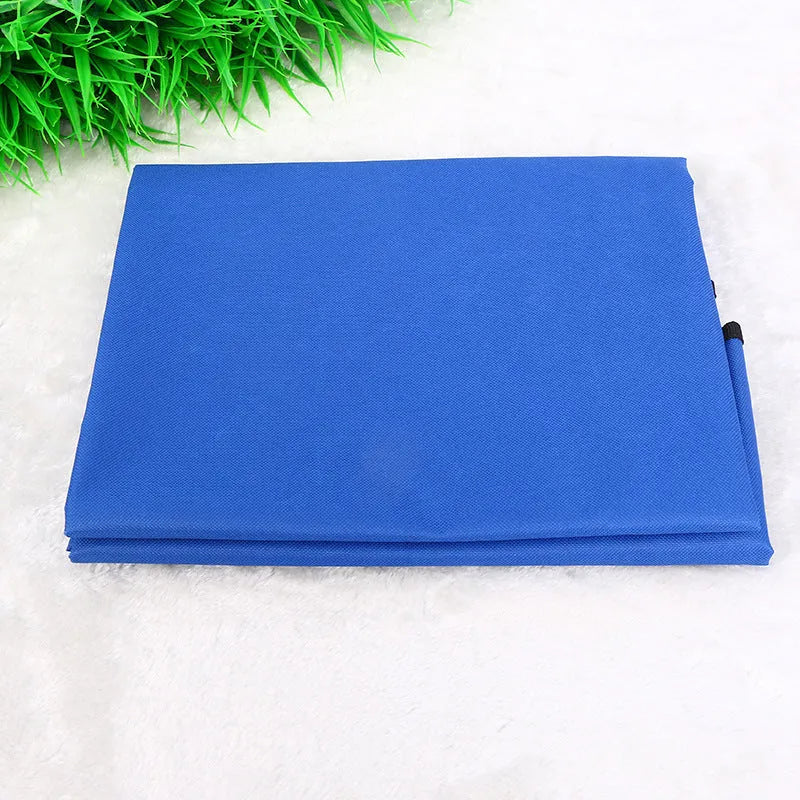 Square red waterproof car pet pad for dogs and cats on a car seat