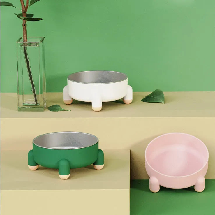 Green non-slip stainless steel pet food bowl with anti-overturn base and raised foot