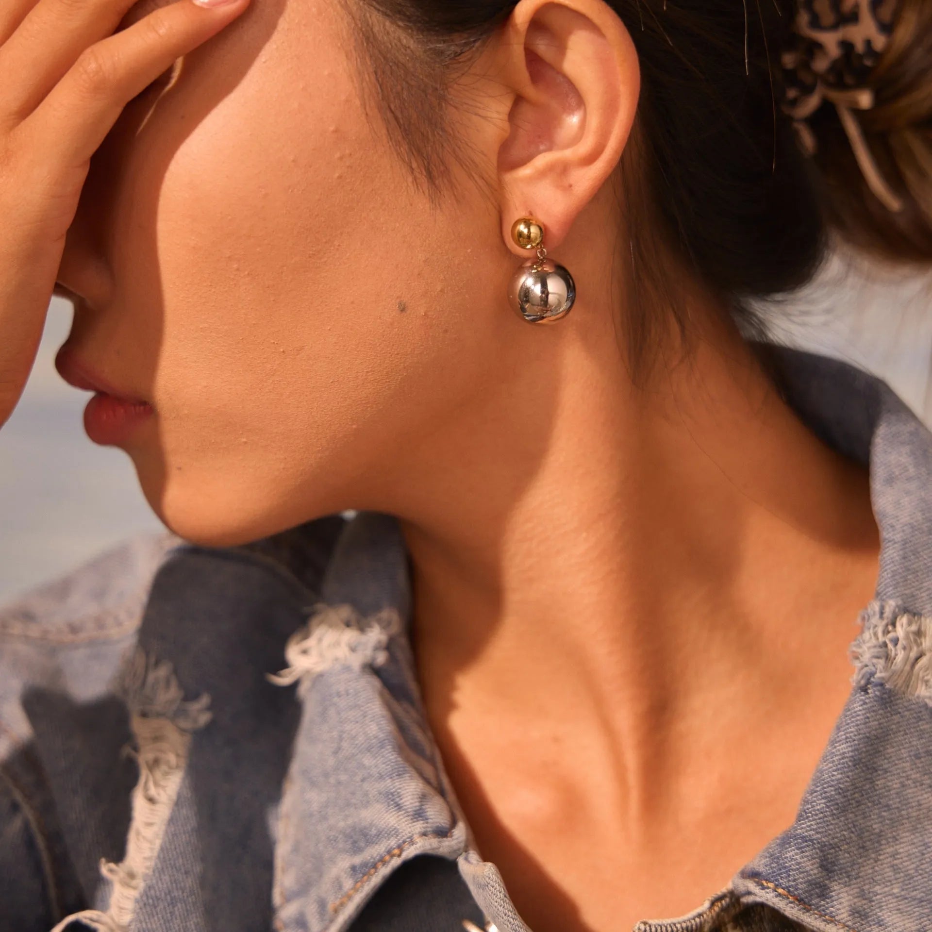 Stainless steel ear studs with colour-block electroplated finish and geometric round bead design