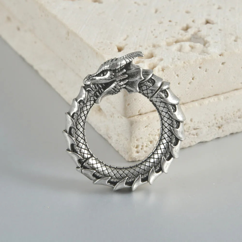Large hollow-out alloy earrings with geometric dragon design in antique silver finish