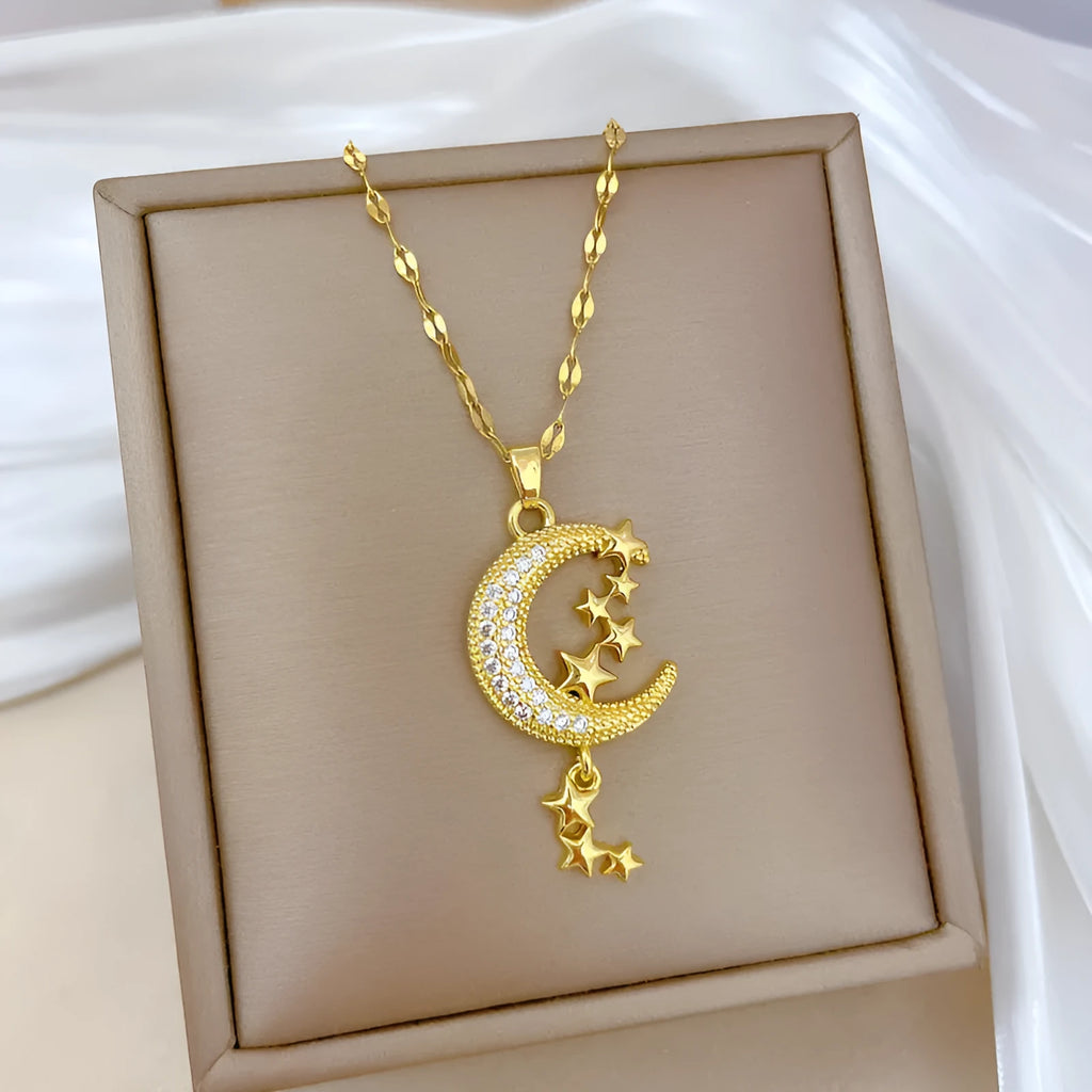 Moon pendant necklace with geometric tassel design and diamond arrangement on stainless steel chain