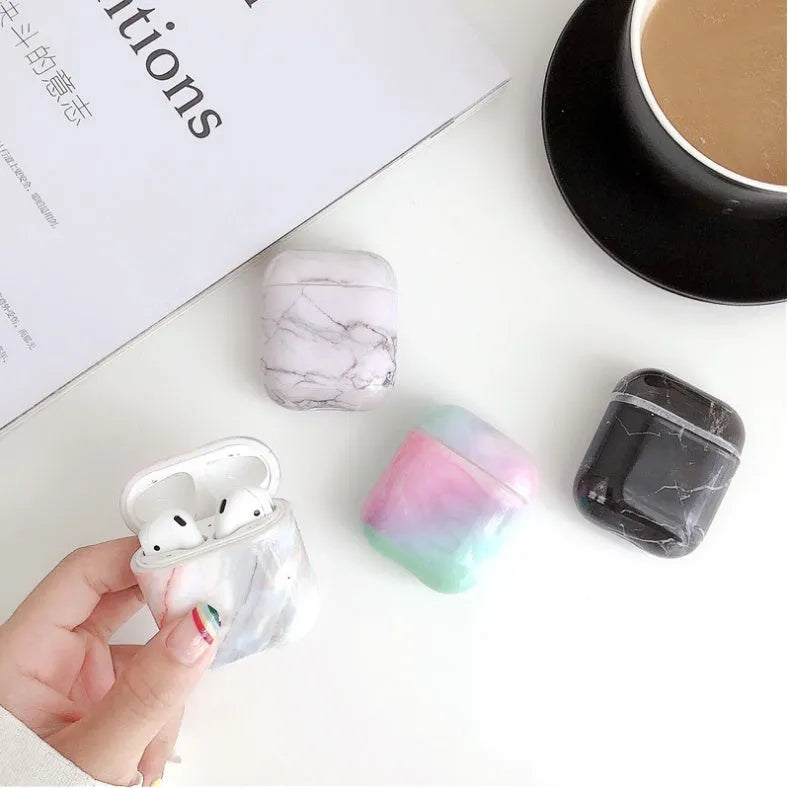 Hard white marble protective case cover for Apple AirPods 1 and AirPods 2 charging case.