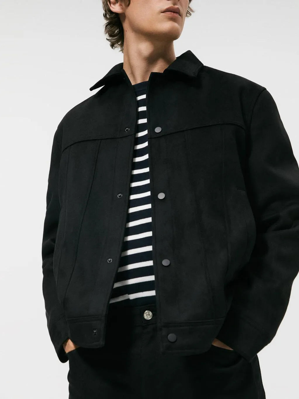 Men's black hooded jacket with suede collar, side pockets, and straight hem design for spring casual wear