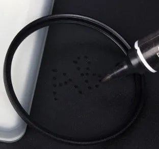 Set of four neutral density camera lens filters with multiple thread size adapters